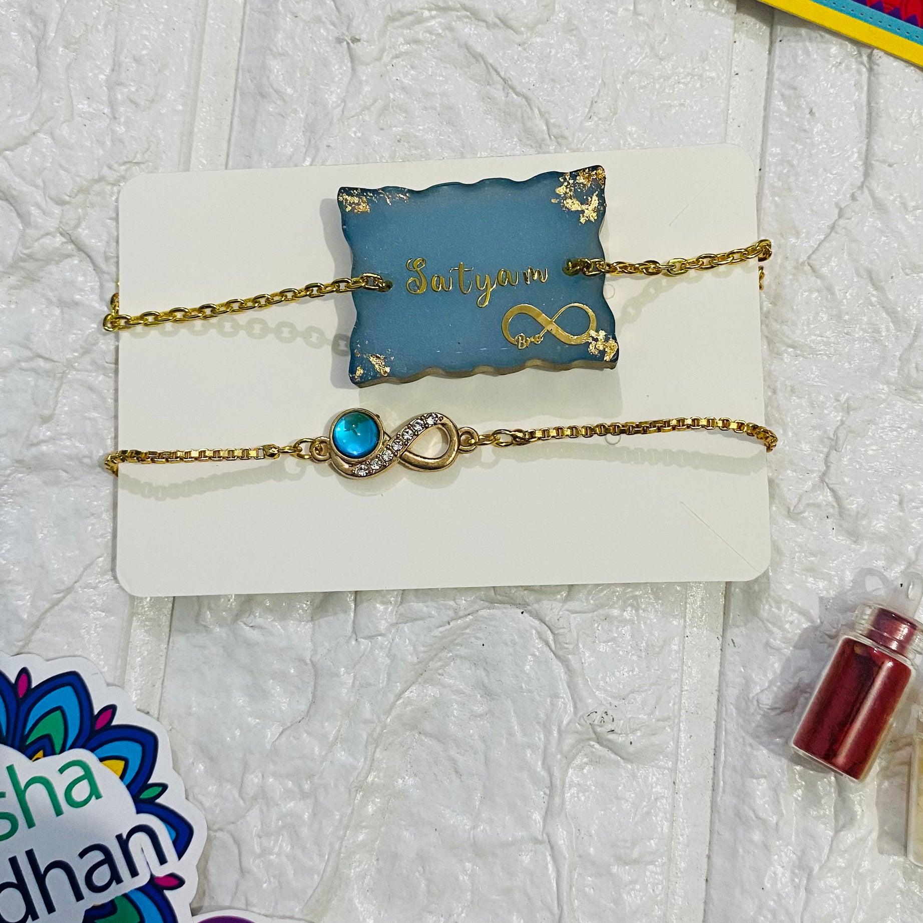 Elegant Resin & Infinity Rakhi: Timeless Bonds and Unending Love : combo of 2 Rakhi